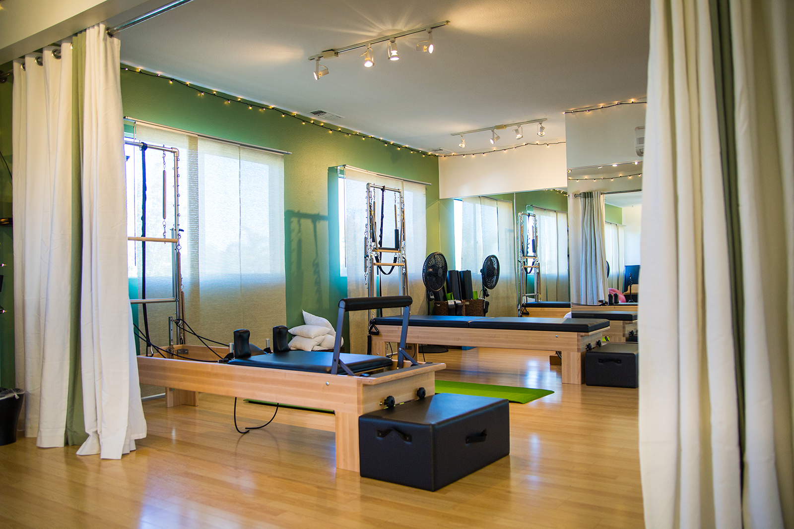 Pilates reformers inside Fit Monkeys private studio in Carlsbad, CA